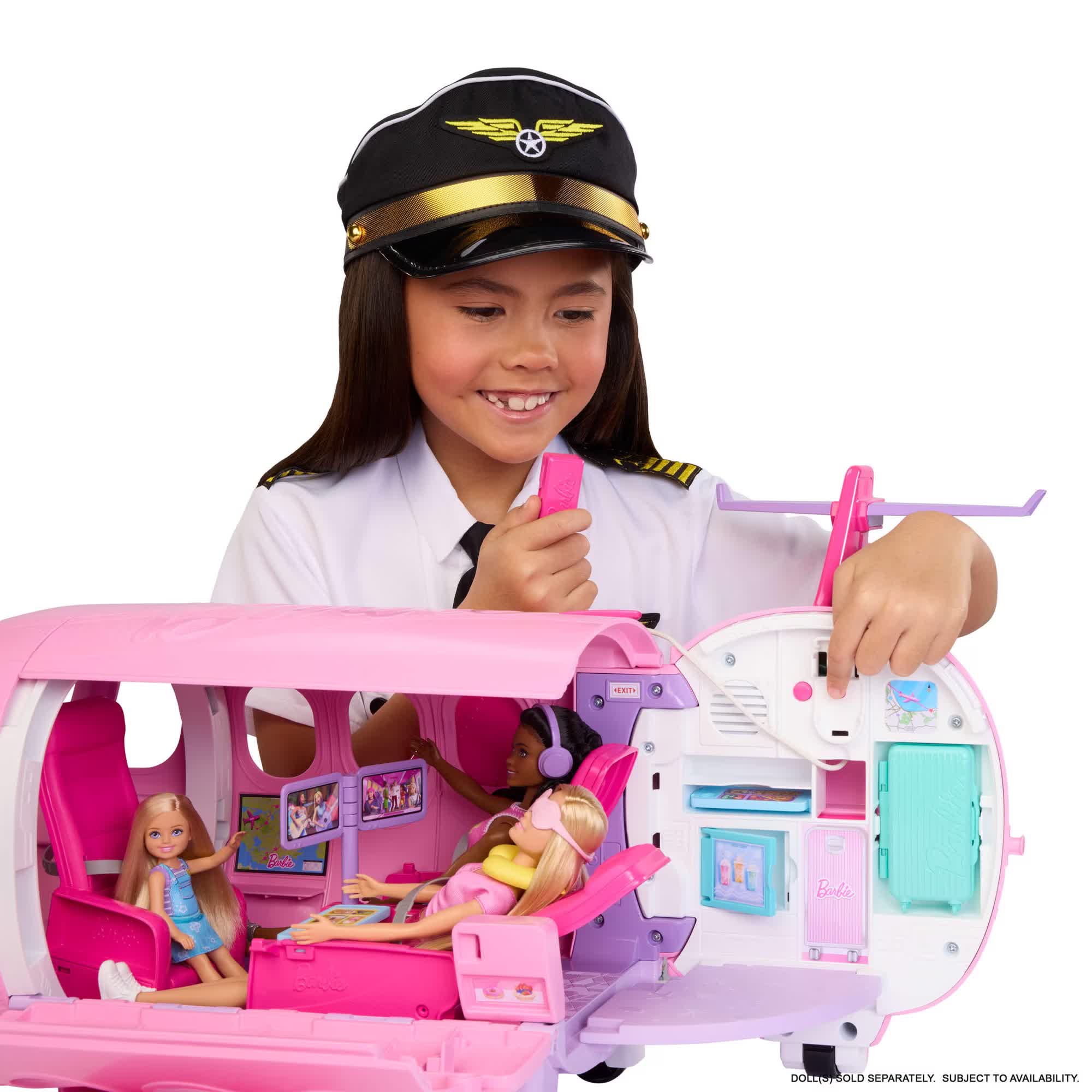 Child playing pilot with the Barbie Dream Airplane, finished product